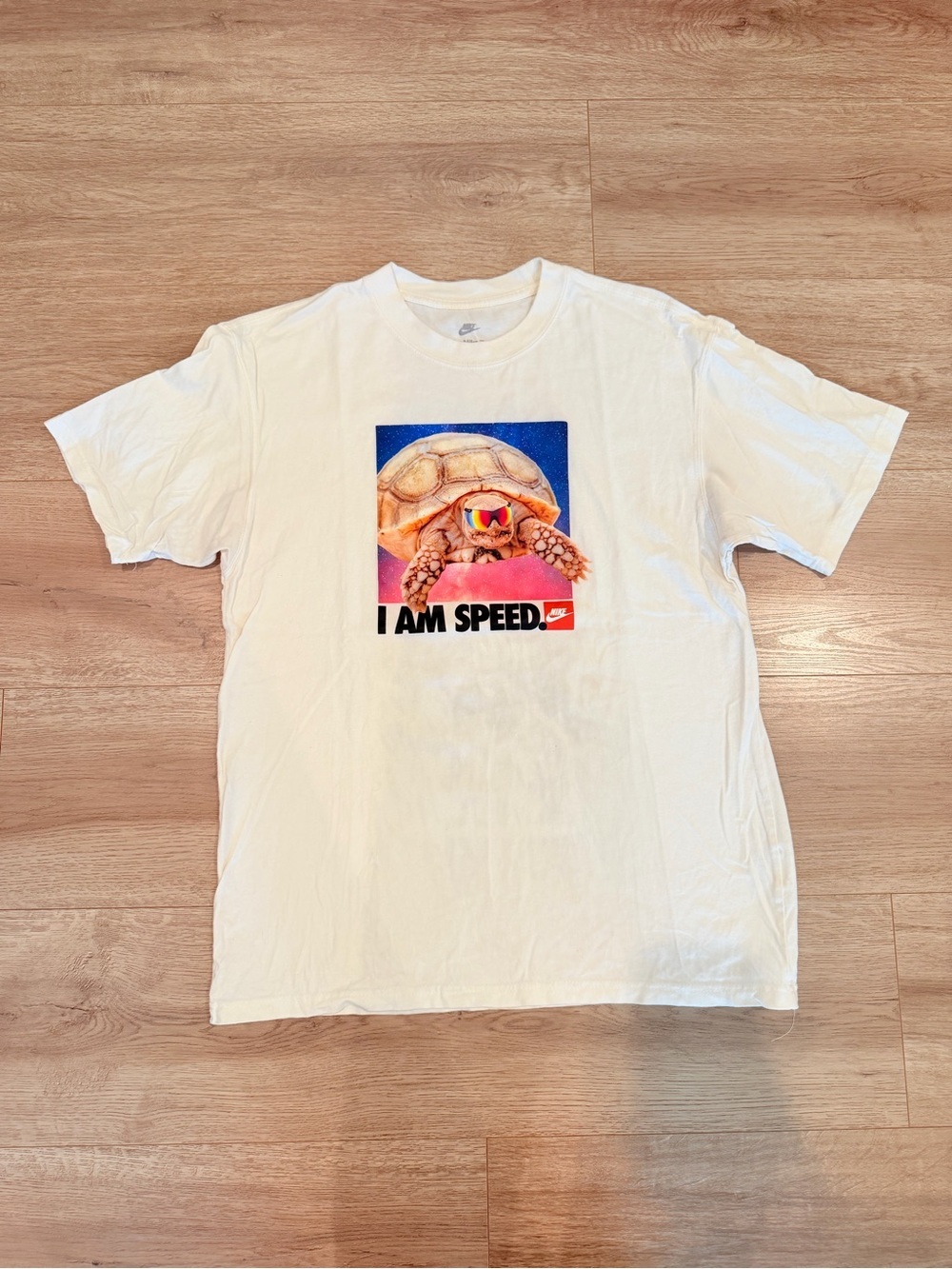 Nike White Short-Sleeve Tee with Colorful Tortoise Graphic